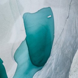 an ice cave with water inside of it
