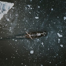 clear glass bottle full of snow